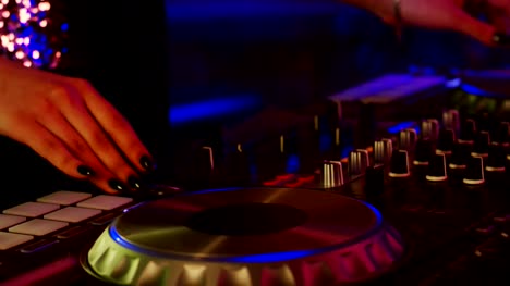 Girl-Dj-Playing-at-a-Nightclub-in-Slow-Motion