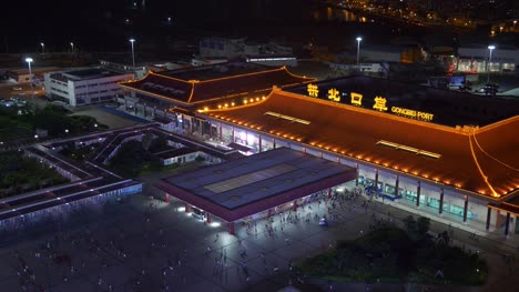 Zhuhai-Stadt-Nacht-beleuchtet-Grenze-Hafen-auf-dem-Dach-Panorama-4k-china