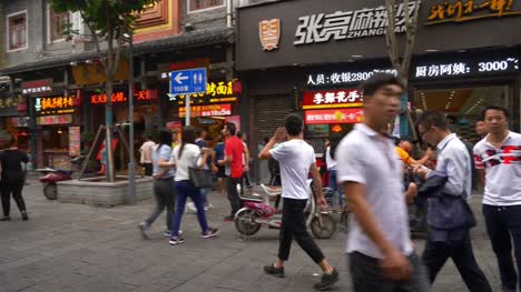 day-time-wuhan-city-famous-walking-street-bikers-panorama-4k-china