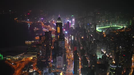 night-time-illuminated-hong-kong-city-downtown-traffic-street-aerial-panorama-4k
