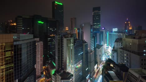 Centro-de-rascacielos-luz-noche-4-k-tiempo-transcurrido-desde-el-techo-de-hong-kong