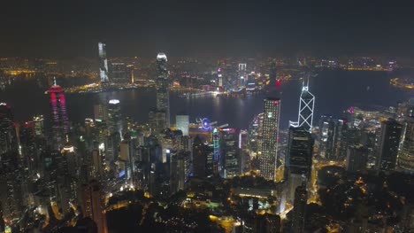China-noche-luz-famoso-hong-kong-ciudad-lantau-isla-bahía-aérea-panorama-4k