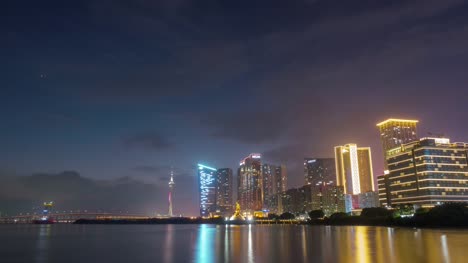 Isla-famosa-de-Macao-China-atardecer-Crepúsculo-ilumina-Bahía-4k-lapso-de-tiempo