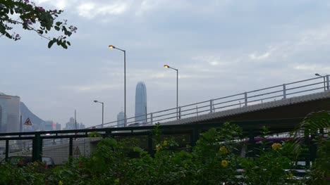 Crepúsculo-cielo-hong-kong-tráfico-carretera-puente-torre-panorama-4k-china