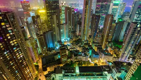 China-Hong-Kong-City-Nacht-Beleuchtung-auf-dem-Dach-nach-unten-Ansicht-Panorama-4k-Zeitraffer