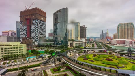 China-famosa-Macao-día-tráfico-calle-hotel-construcción-panorama-4k-lapso-de-tiempo