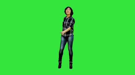 Successful-young-business-woman-happy-for-her-success-on-a-Green-Screen,-Chroma-Key