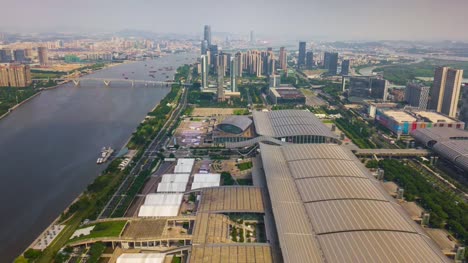 china-sunny-day-guangzhou-city-famous-convention-and-exhibition-centre-aerial-panorama-4k-timelapse
