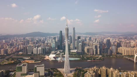 China-día-soleado-guangzhou-ciudad-centro-río-Perla-Cantón-torre-panorama-aéreo-4k-timelapse