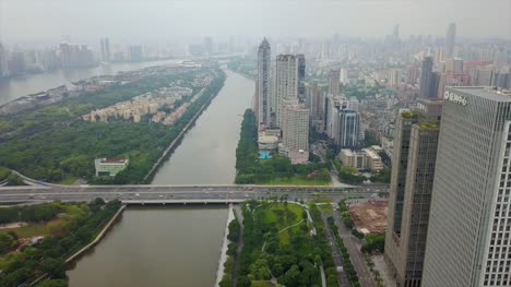 China-guangzhou-paisaje-urbano-río-Perla-día-tiempo-aéreo-panorama-4k