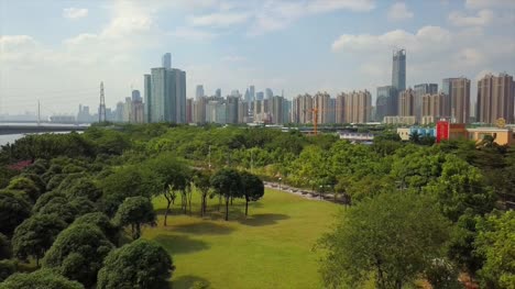 sonnigen-Tag-Guangzhou-Stadt-Perlfluss-Innenstadt-Park-Luftbild-Panorama-4k-china