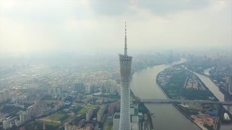 día-tiempo-paisaje-urbano-Cantón-río-torre-panorama-aéreo-4k-Cantón