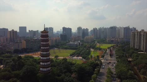 día-tiempo-guangazhou-ciudad-chigang-famosa-pagoda-Parque-tráfico-aéreo-panorama-4k-china