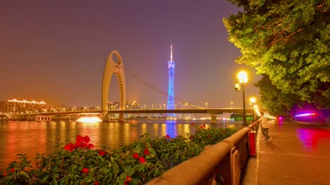 puesta-del-sol-ciudad-de-guangzhou-Cantón-torre-puente-Bahía-flores-4k-timelapse-china