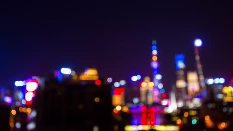 iluminación-nocturna-de-Shangai-pudong-borroso-panorama-Bahía-4k-timelapse-china
