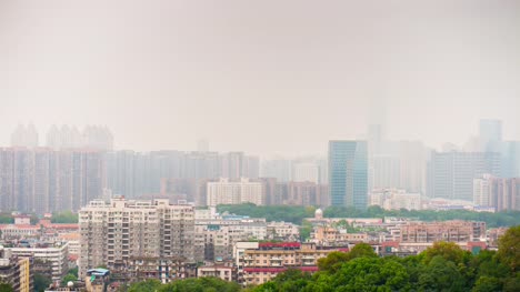 sunny-foggy-day-light-wuhan-cityscape-rooftop-panorama-4k-time-lapse-china