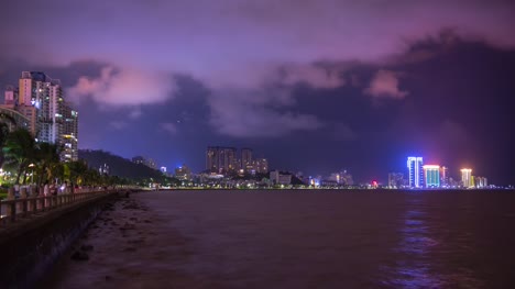 China-noche-cielo-luz-zhuhai-ciudad-Bahía-Costa-panorama-4k-timelapse