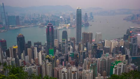 Tag-zu-Nacht-Zeitraffer-Video-von-Hong-Kong-City-Skyline-Blick-von-der-Spitze-Zeitraffer-4K