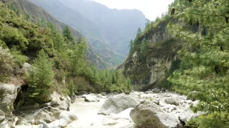 Suspension-bridge-over-the-river-in-mountains-of-Nepal.-Manaslu-circuit-trek.