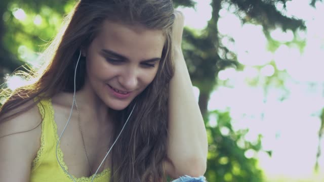 girl-with-headphones-in-the-Park
