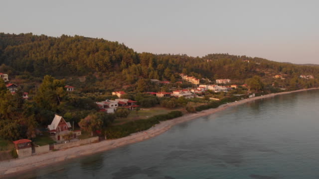 Aerial-view-of-the-small-Greek-village-on-the-shore-of-the-Aegean-Sea