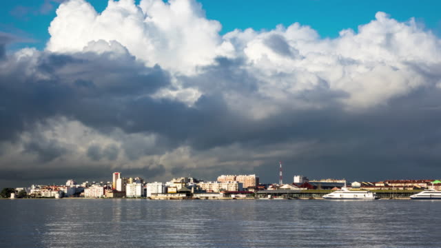 Fluffy-Clouds-over-City-and-Ferry-Terminal