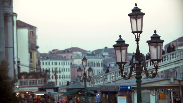 Venice-scene-with-people-on-the-bridge-and-street-lantern