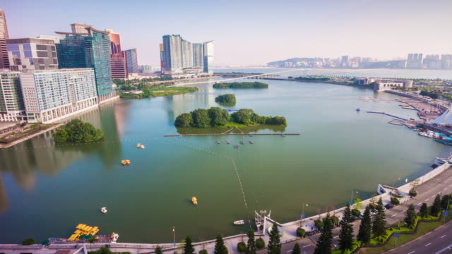 China-al-atardecer-luz-Macao-ciudad-famosa-bahía-panorama-4k-lapso-de-tiempo