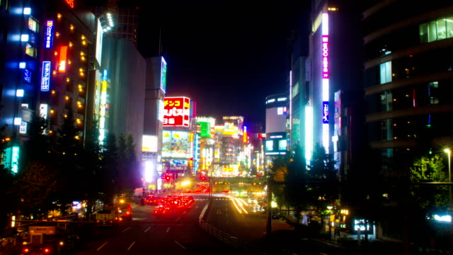 Night-lapse-4K-resolution-at-Shinjuku-yasukuni-ave.-wide-shot-zoom-out