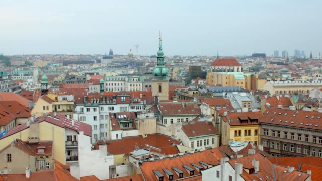 top-view-of-red-roofs,-spiles-and-castle-in-Prague