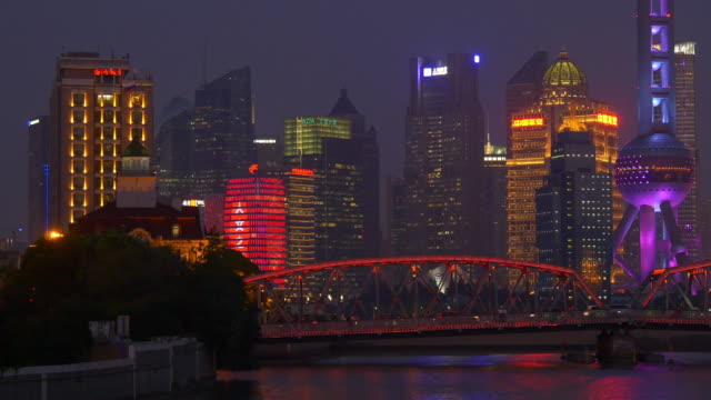 iluminación-nocturna-shanghai-ciudad-famoso-río-Centro-Bahía-puente-panorama-4k-china