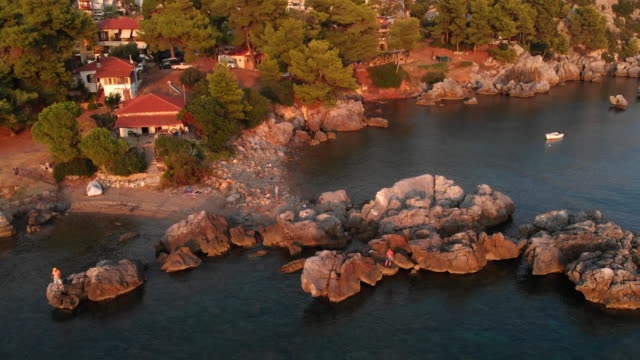 Aerial-view-of-Greek-village-by-the-sea-and-in-the-mountains