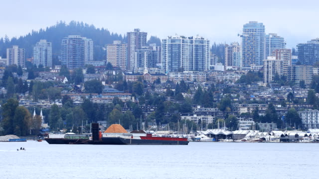Skyline-of-Vancouver,-British-Columbia-across-harbor