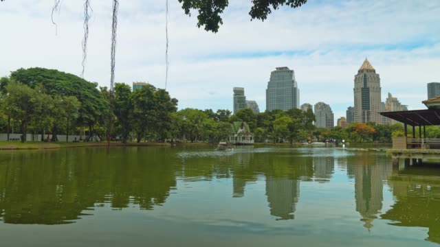 office-building-business-center-overlooking-a-green-park-with-a-lake.-urban-style.-cityscape