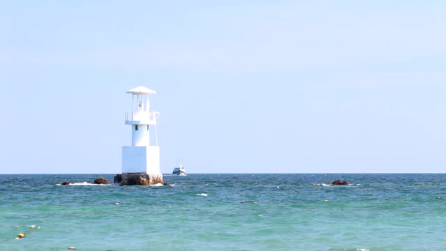 Lighthouse-in-the-ocean-with-blue-sky