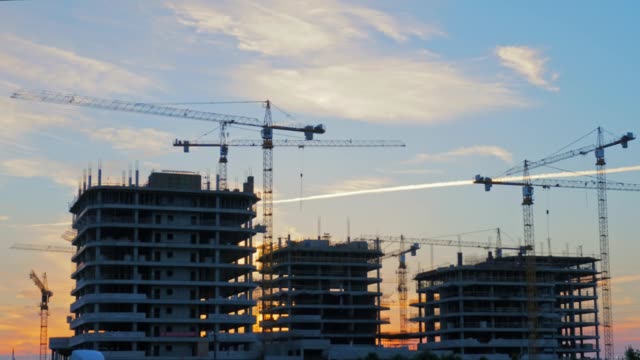 Construction-of-modern-buildings-with-tower-cranes.-Timelapse