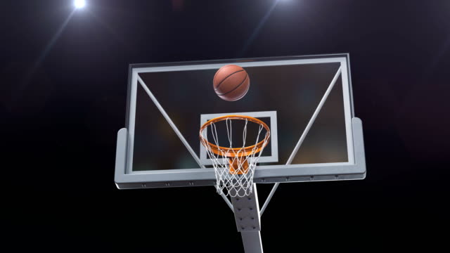 Schöne-lange-Wurf-im-Basketball-Hoop-Zeitlupe-Kamera-Fliege.-Ball-fliegt-Spinning-in-Korb-Netto-Stadion-blauen-Strahler-Flares.-Sport-Konzept-3d-Animation