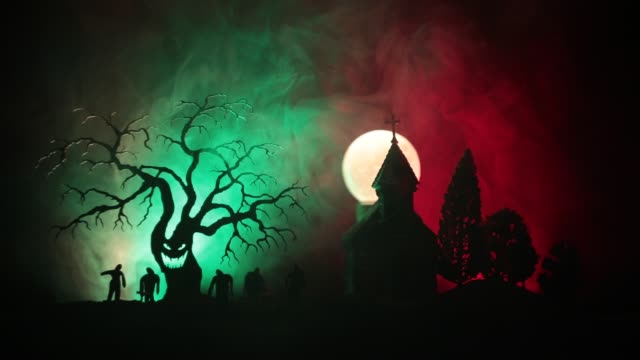 Scary-view-of-zombies-at-cemetery-dead-tree,-moon