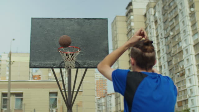 Streetball-player-failing-to-score-after-set-shot