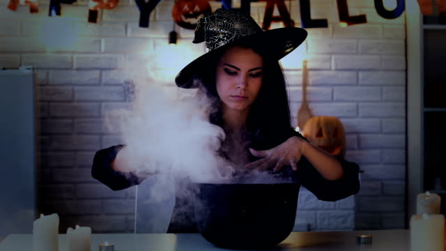 Mysterious-young-woman-in-witch-costume-cooking-potion,-preparing-for-Halloween