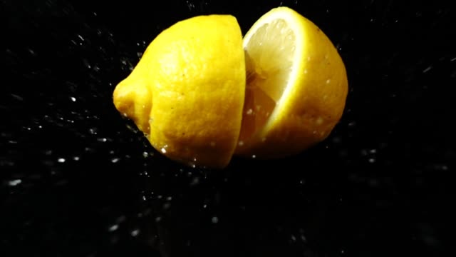 Falling-of-segments-of-a-lemon.-Slow-motion.