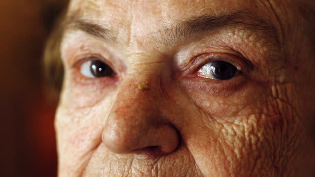 Close-Up-Portrait-On-Old-Woman's-Eyes:-Portrait-Of-sad-Elderly-Woman