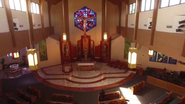 Jesus-on-cross-inside-church-aerial