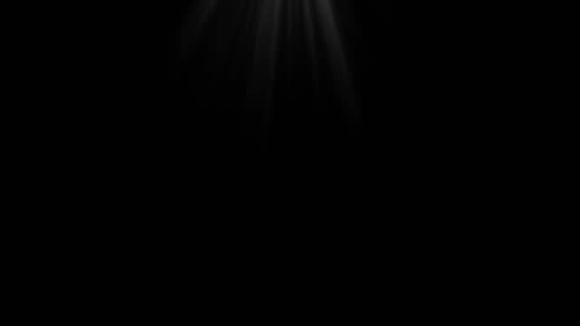 Volume-lights-ray-on-black-background-looped-for-overlay-with-copyspace