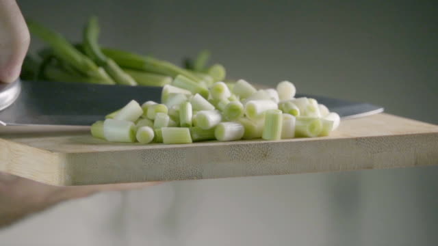 Falling-of-green-onion.-Slow-motion-240-fps