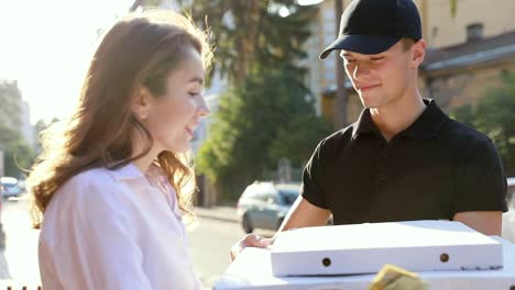 Pizza-Delivery.-Courier-Delivering-Box-With-Food-To-Client