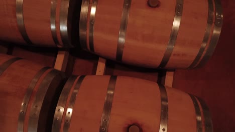 Aerial-view-Barrels-in-a-wine-cellar,-Bordeaux-Vineyard,-France