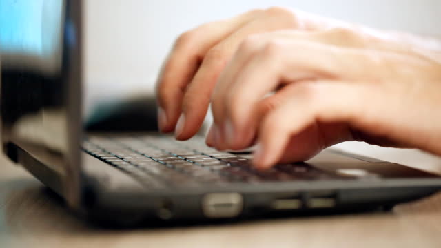 Fingers-typing-on-keyboard