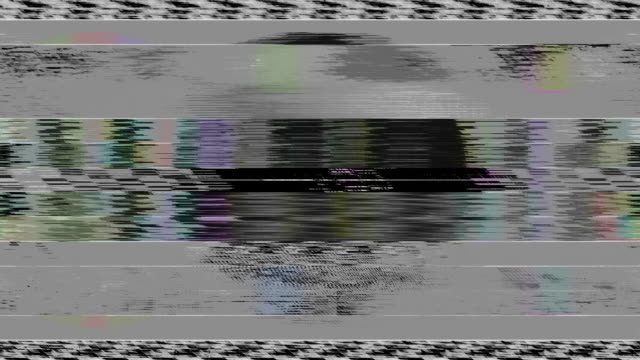 GLITCH:-TV-interference,-static,-distorted-test-card-or-test-pattern-with-colour-static-and-noise
