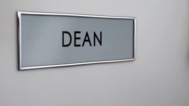 Dean-office-door,-hand-knocking,-chief-executive-officer,-school-director